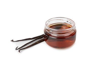 Vanilla extract in glassware isolated on white background. Vanilla extract for baking and desserts. Aromatic Homemade Vanilla Extract. Close -up. Place for the text. Copy space.