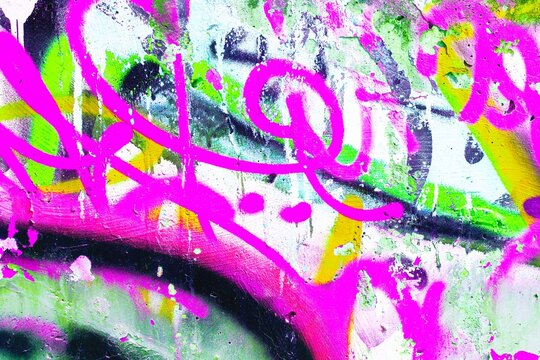 Vibrant neon graffiti in pink, green, yellow with urban 80s, punk style, fluorescent splashes, abstract waves. Street art, edgy backgrounds, modern creative banner, urban visuals.
