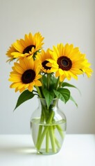 Sunflowers and lilies in vase on white surface , flowers, arrangement