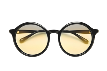 Round, black-rimmed glasses with yellow-tinted lenses on a transparent background. Lightweight style. Eyewear fashion