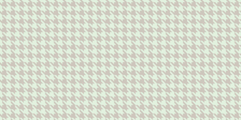 Elegant houndstooth pattern in soft pastel hues.  Perfect for textile design, website backgrounds, or fashionrelated projects.
