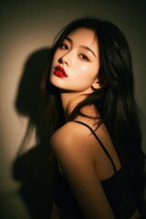 Naklejka premium a close up of a woman with a red lipstick and a black bra top