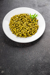 Green peas canned appetizer vegetables dish organic product fresh tasty gourmet food background on the table rustic food top view copy space keto and paleo diet vegetarian and vegan food