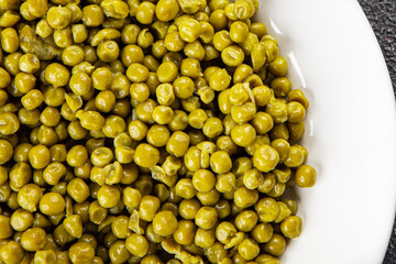 Green peas canned appetizer vegetables dish organic product fresh tasty gourmet food background on the table rustic food top view copy space keto and paleo diet vegetarian and vegan food