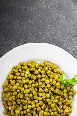 Green peas canned appetizer vegetables dish organic product fresh tasty gourmet food background on the table rustic food top view copy space keto and paleo diet vegetarian and vegan food