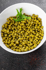 Green peas canned appetizer vegetables dish organic product fresh tasty gourmet food background on the table rustic food top view copy space keto and paleo diet vegetarian and vegan food