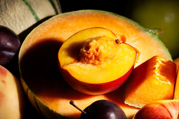 sliced nectarine fruit mix on black background