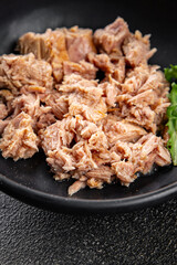 Tuna canned fish seafood appetizer dish organic product fresh tasty gourmet food background on the table rustic food top view copy space keto and paleo pescetarian diet
