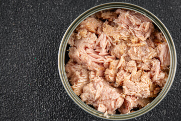 Tuna canned fish seafood appetizer dish organic product fresh tasty gourmet food background on the table rustic food top view copy space keto and paleo pescetarian diet