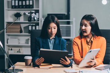 Businesswoman or accountant working Financial investment on calculator, calculate, analyze business and marketing growth on financial document data graph, Accounting, Economic, commercial concept.