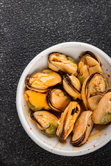 Mussels canned seafood appetizer dish organic product fresh tasty gourmet food background on the table rustic food top view copy space 