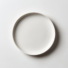 Plain ceramic plate isolated on white background