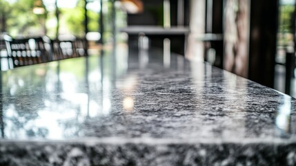 Obraz premium Sleek gray marble kitchen counter with modern bar stools, minimalist elegance in a contemporary home 