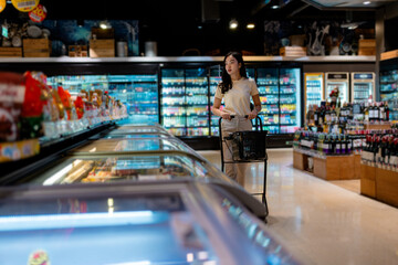 Young Woman Shopping in Modern Grocery Store
