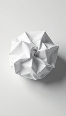White paper crumpled into tight ball with sharp creases and wrinkles, wrinkles, art, close-up