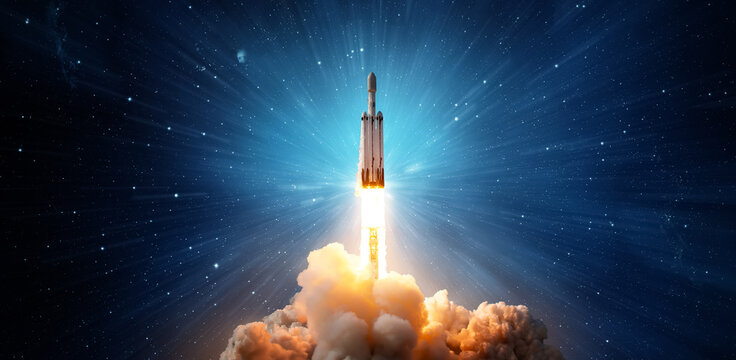 The spaceship takes off into the starry sky. A rocket is launched into space. Elements of this image furnished by NASA.