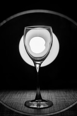 Glass with a water reflected in mirror