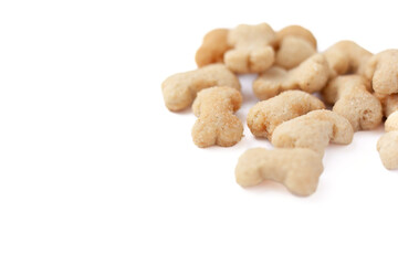 Bone shaped dry dog treats on white background

