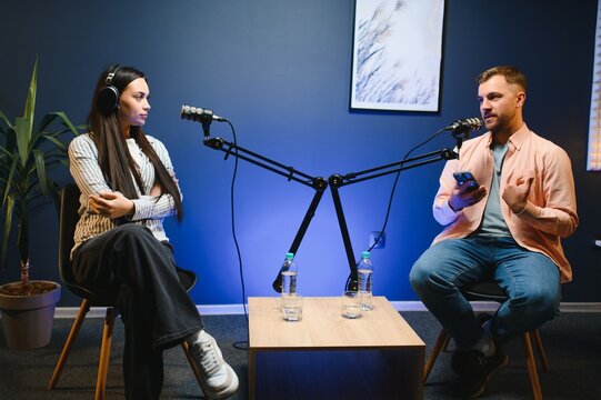 Show host interviewing woman during live stream, talking about fashion and style trends, disagreeing with her opinions. Man arguing with social media celebrity, recording podcast