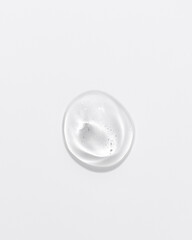 Cosmetic gel or beauty jelly serum texture background. Transparent skin care collagen product