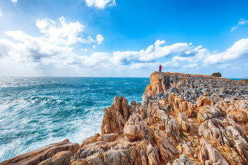 Unbelivable view of cliffs in valley Cala Domestica  and storm on the sea