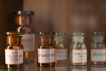 vintage pharmacy bottles of medicine,  background on pharmaceutical, chemistry, medical, old science