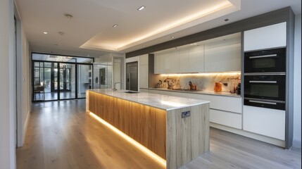 Obraz premium Modern two-tone kitchen with concealed lighting 