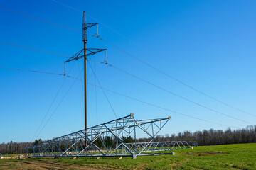 New high-voltage power line support horizontally on the ground to replace the old support