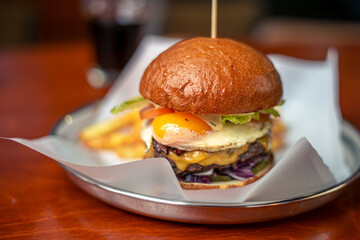 Burger close-up. Fast food and cheat meal concept. Junk food.