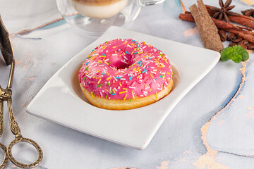 Sweet donut with strawberry icing