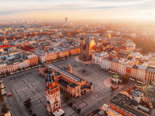 Main market Square with St. Mary's Basilica, city view in Krakow Poland.  Autumn landscape.