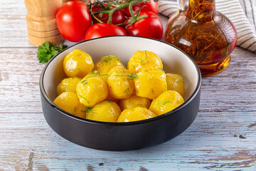 Boiled young potato with oil