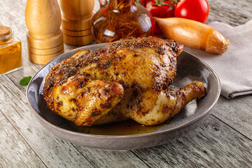 Baked in oven whole chicken with spices