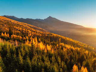 Obraz premium Sunset over Liptov region with and High Tatras mountains around. Krivan landspace, slovakia. Podbanske.