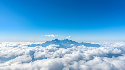Majestic Mountain Peaks Above Fluffy Clouds