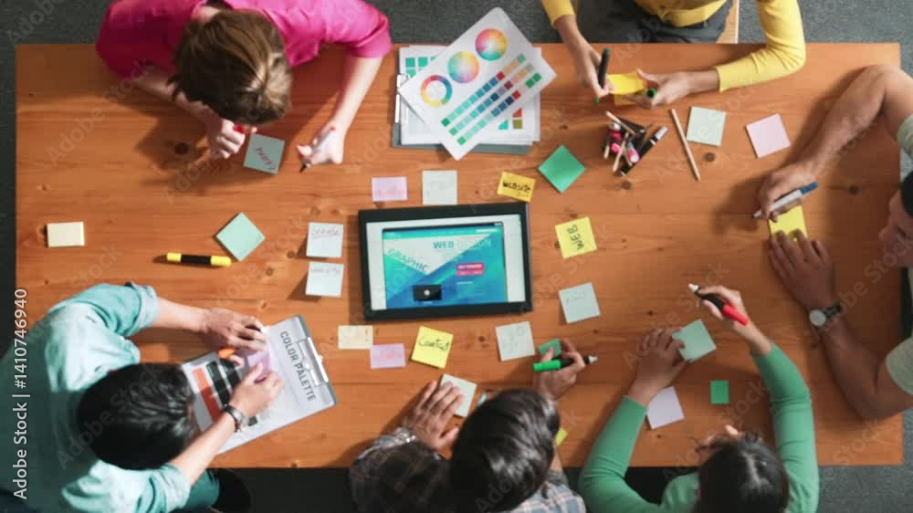 Poster time lapse of smart business people working together to design web design. aerial view of designer b