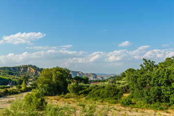 Obraz premium rural countryside landscape during a sunny summer day inside Val d'Agri, Basilicata