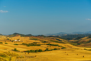 Fototapeta premium rural countryside landscape during a sunny summer day inside Val d'Agri, Basilicata