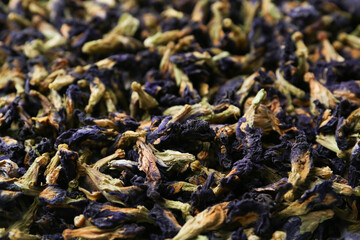 Butterfly pea flower tea as background, closeup
