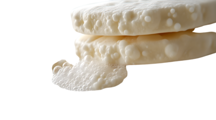 Foamy Layers A Detailed CloseUp of Bubbly Creamy Substance Floating on a Dark Background