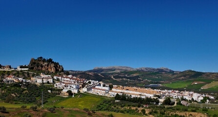 Fototapeta premium Panoramic view of Pruna village with its castle dominating the landscape in Andalusia, Spain