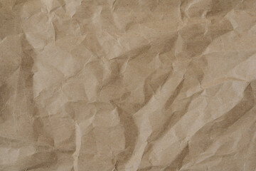 Texture of crumpled craft paper. Clean paper background. Horizontal empty paper template for posters and banners.