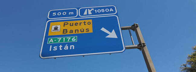 Road sign showing directions to Puerto Banus and Istan in Marbella, Spain