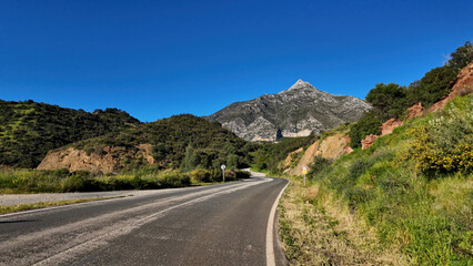 Winding road leading to La Concha mountain peak in Marbella, Spain