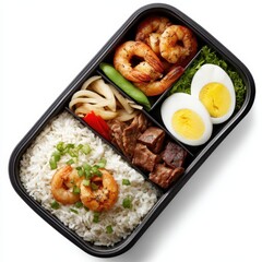Bento box with shrimp, rice, vegetables, and egg