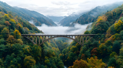 Autumnal Mountain Bridge With Foggy Valley