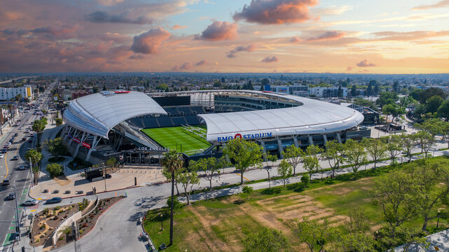 aerial shot of BMO Stadium soccer field home of the Los Angeles Football Club with lush green trees in Los Angeles California USA