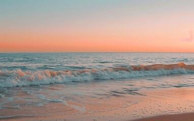A peaceful beach at sunrise with soft pastel hues illuminating the sky