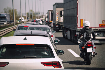 Traffic jam on highway cars trucks motorcycle