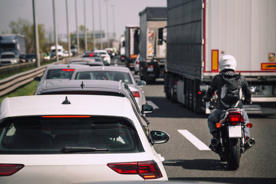 Traffic jam on highway cars trucks motorcycle